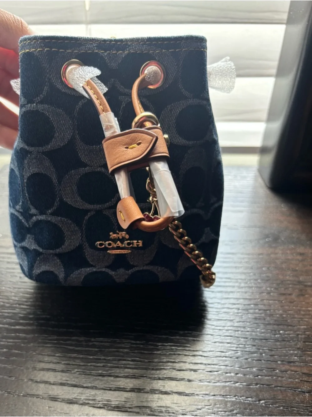 Coach Signature Denim Drawstring Wristlet
Navy Mini Bucket Bag with Gold Chain - Picture 10 of 10